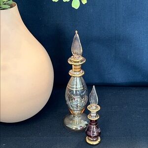 Vintage perfume bottles and stoppers Egyptian style cranberry perfume bottle